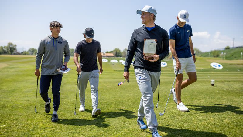 Tyson Shelley, Keanu Akina, Zac Jones and Brock Goyen, four BYU golfers who made it through the first stage of U.S. Open qualifying, walk back to resume practice after posing for photos at the Cougars’ practice facility in American Fork on Thursday, May 11, 2023.