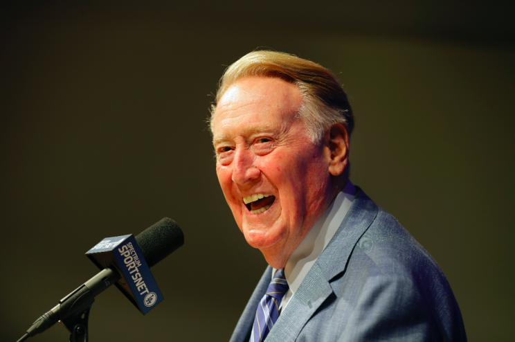 Vin Scully won’t go out of his way to watch the Dodgers’ opener. (AP Photo)