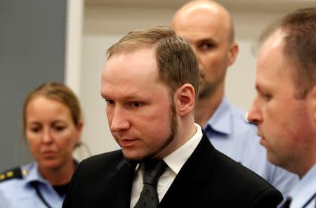 Norwegian mass killer Anders Behring Breivik reacts as he returns after a break to the court room, in Oslo Courthouse August 24, 2012. REUTERS/Stoyan Nenov/Files