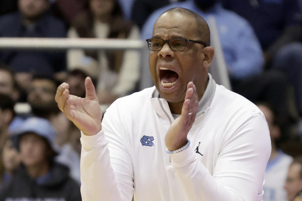 North Carolina head coach Hubert Davis cheers on his team during the second half of an NCAA college basketball game against James Madison Sunday, Nov. 20, 2022, in Chapel Hill, N.C. (AP Photo/Chris Seward)