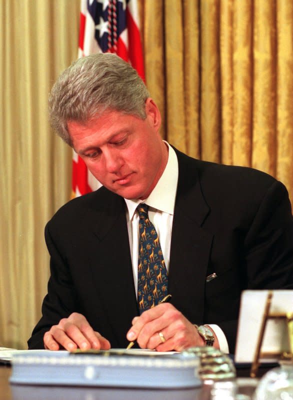 On December 8, 1993, U.S. President Bill Clinton, pictured in 1995, signed the North American Free Trade Agreement into law. File Photo by Ken Cedeno/UPI