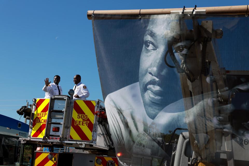 MIAMI, FLORIDA - JANUARY 16: An image of Dr. Martin Luther King Jr. hangs on the back of a sanitation department truck during the Dr. Martin Luther King Jr. Day Parade in the Liberty City neighborhood on January 16, 2023 in Miami, Florida. The annual event honors the late civil rights leader. (Photo by Joe Raedle/Getty Images) ORG XMIT: 775925349 ORIG FILE ID: 1456869669