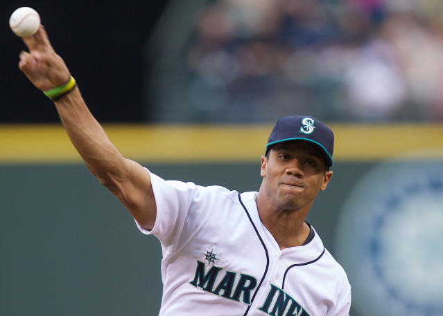 Russell Wilson throws first pitch at Rockies Opening Day