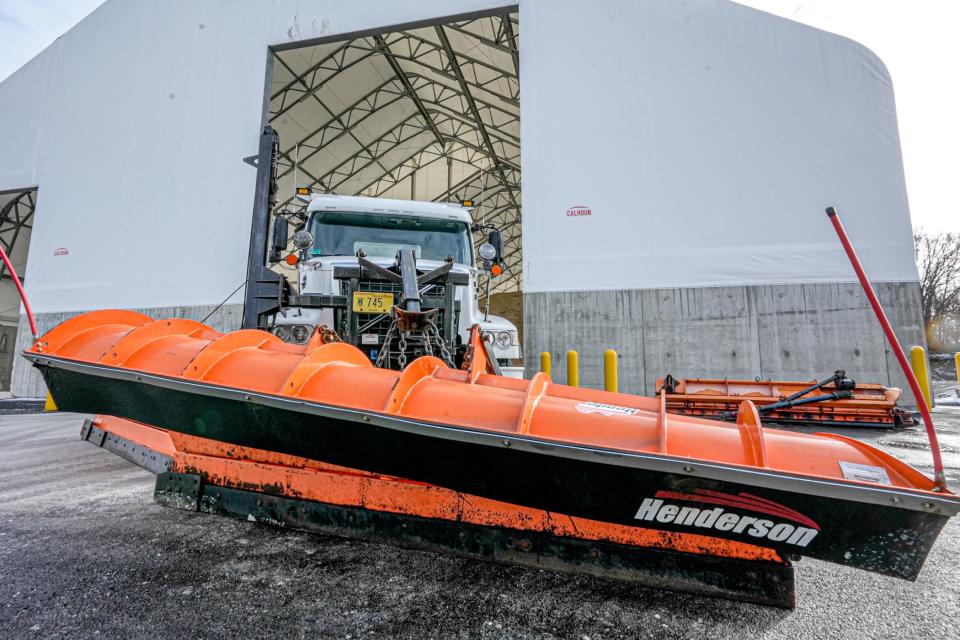 A snowplow is prepped at the DOT's East Providence depot. Forecasters are predicting 3 to 4 inches of snow for the northwest corner of Rhode Island. Providence should get 1 to 2 inches.