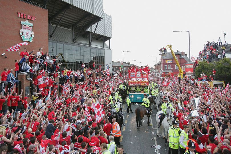 The team bus goes past the Kop at Anfield during the homecoming victory parade through the streets of Liverpool on May 26, 2005 in Liverpool, England.  Liverpool defeated AC Milan in a penalty shoot out 3-2 to win the UEFA Champions League final.