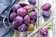 <p>Dark-hued fruits, such as plums and prunes, are packed with powerful antioxidants that work to fight free-radical damage in the body. </p><p>“Free radicals in the environment can cause damage to our cells, altering their appearance or function, and can even lead to cancer,” warns Roger E. Adams, PhD, a personal trainer and owner of <u><a href="https://eatrightfitness.com/" rel="nofollow noopener" target="_blank" data-ylk="slk:eatrightfitness;elm:context_link;itc:0;sec:content-canvas" class="link ">eatrightfitness</a></u>. “The protective effect of antioxidants can keep cells in the body from degrading as quickly and succumbing to the detrimental effects of aging.” Chop up some plums and prunes and toss them into a salad or a smoothie for a hint of natural sweetness.</p>