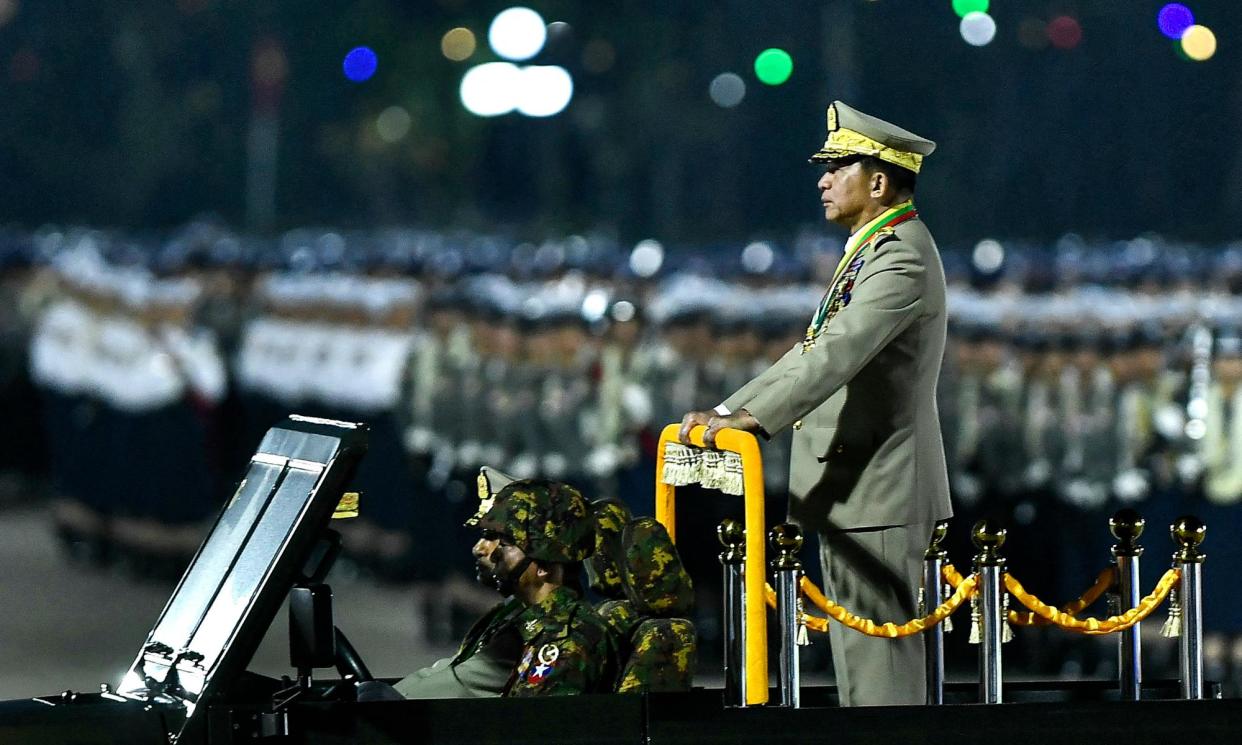 <span>Myanmar's junta chief, Sr Gen Min Aung Hlaing, arrives to deliver a speech at a ceremony to mark the country's Armed Forces Day. The regime is on the brink of losing control of a key town on the Thailand border in another defeat.</span><span>Photograph: AFP/Getty Images</span>