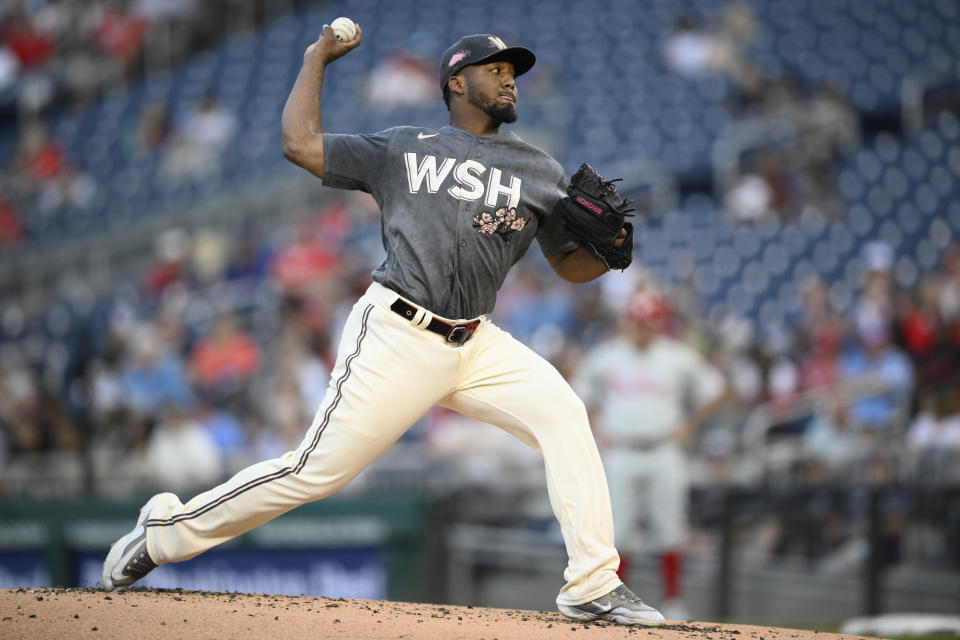 Washington Nationals starting pitcher Joan Adon throws during the second inning of a baseball game against the Philadelphia Phillies, Friday, Aug. 18, 2023, in Washington. (AP Photo/Nick Wass)