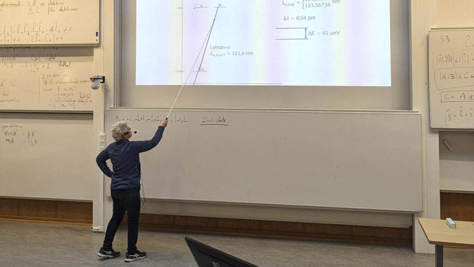 Nobel laureate Anne L'Huillier, who is one of this year's Nobel laureates in Physics, holds a lecture after being notified about the award, at the Lund University, in Lund, Sweden, on Tuesday, Oct. 3, 2023. The Nobel Prize in physics has been awarded to Pierre Agostini, Ferenc Krausz and Anne L’Huillier for looking at electrons in atoms by the tiniest of split seconds. (Aron Allen via AP)