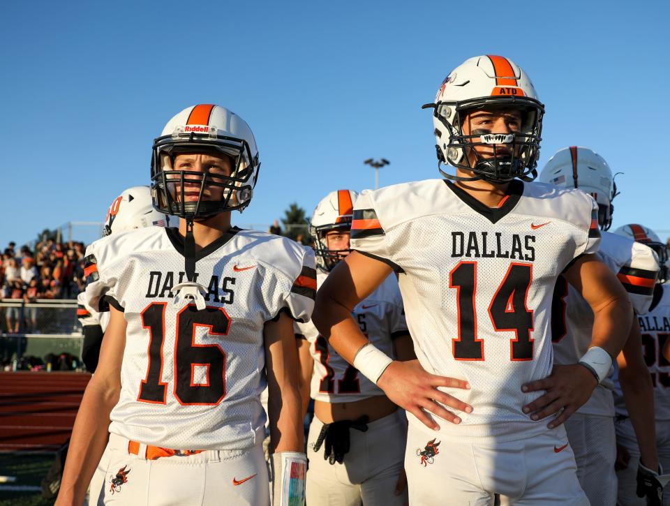 Dallas' Chase Eriksen (16) and Isaiah Mosley (14) wait for the game against McKay to begin.