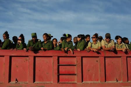 Soldiers are seen after looking at the caravan carrying the ashes of Cuba's late President Fidel Castro toward the Santa Ifigenia cemetery in Santiago de Cuba, Cuba, December 4, 2016. REUTERS/Edgard Garrido