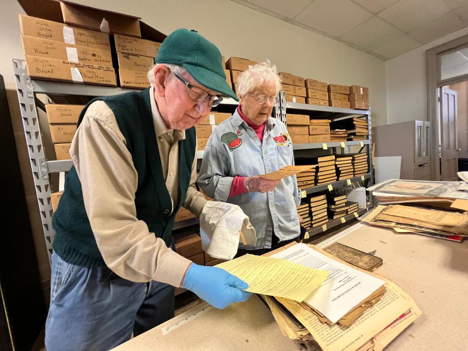 Herb and Helen Phillips work with the Altoona Area Historical Society's collection in March 2022. The organization was working to inventory and digitize its collection.