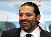 Newly-assigned Lebanese Prime Minister Saad Hariri, smiles as he speaks to journalists at the presidential palace in Baabda, east of Beirut, Lebanon, Thursday, Jan. 31, 2019. Lebanese political factions have agreed on the formation of a new government, breaking a nine-month deadlock that only deepened the country' economic woes. (AP Photo/Hussein Malla)