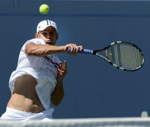 Andy Roddick hits a return against Rhyne Williams of the US during their US open men's first round match in New York on Tuesday. Roddick says the US Open, where he faces Australia's Bernard Tomic in a second-round match Friday at Arthur Ashe Stadium, will be his farewell event