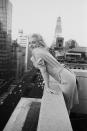 <p>Marilyn Monroe poses on the balcony of her room at the Ambassador Hotel. This is just one of the photos of the late actress around New York City that has become iconic. </p>