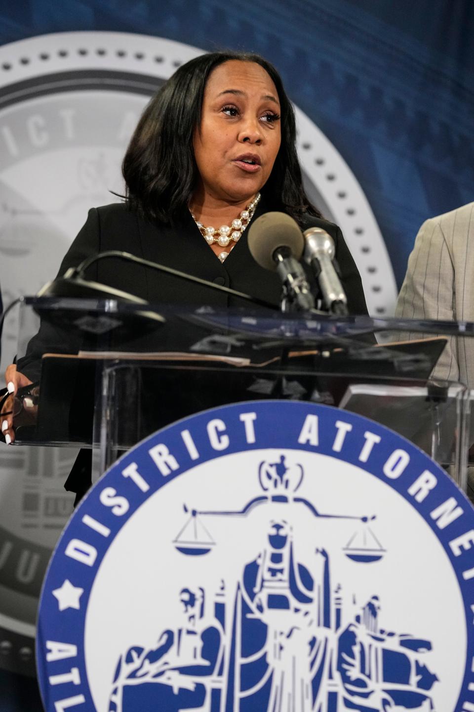 Fulton County District Attorney Fani Willis speaks in the Fulton County Government Center during a news conference, Monday, Aug. 14, 2023, in Atlanta. Donald Trump and several allies have been indicted in Georgia over efforts to overturn his 2020 election loss in the state.