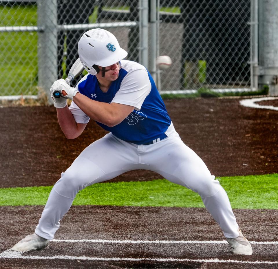 Oak Creek's Nate Schopf hits for average and power.