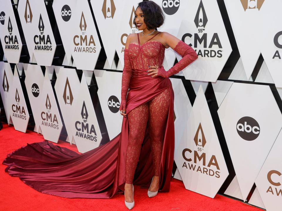 Jennifer Hudson poses for a photo on the CMAs red carpet.