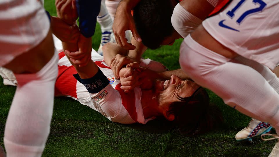 Luka Modrić (C) thought he had scored the winner. - Christophe Simon/AFP/Getty Images