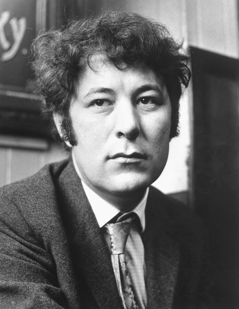 FILE - Irish poet and playwright Seamus Heaney is seen on May 1, 1970. Presidents have long made a point of citing a favorite writer, and for President Joe Biden that often has been Heaney, renowned for what Nobel judges in 1995 called “works of lyrical beauty and ethical depth."(PA via AP, File)
