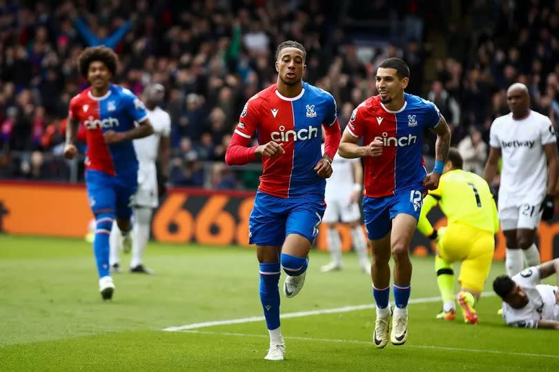 Michael Olise wheels away to celebrate after scoring for Crystal Palace at Selhurst Park.