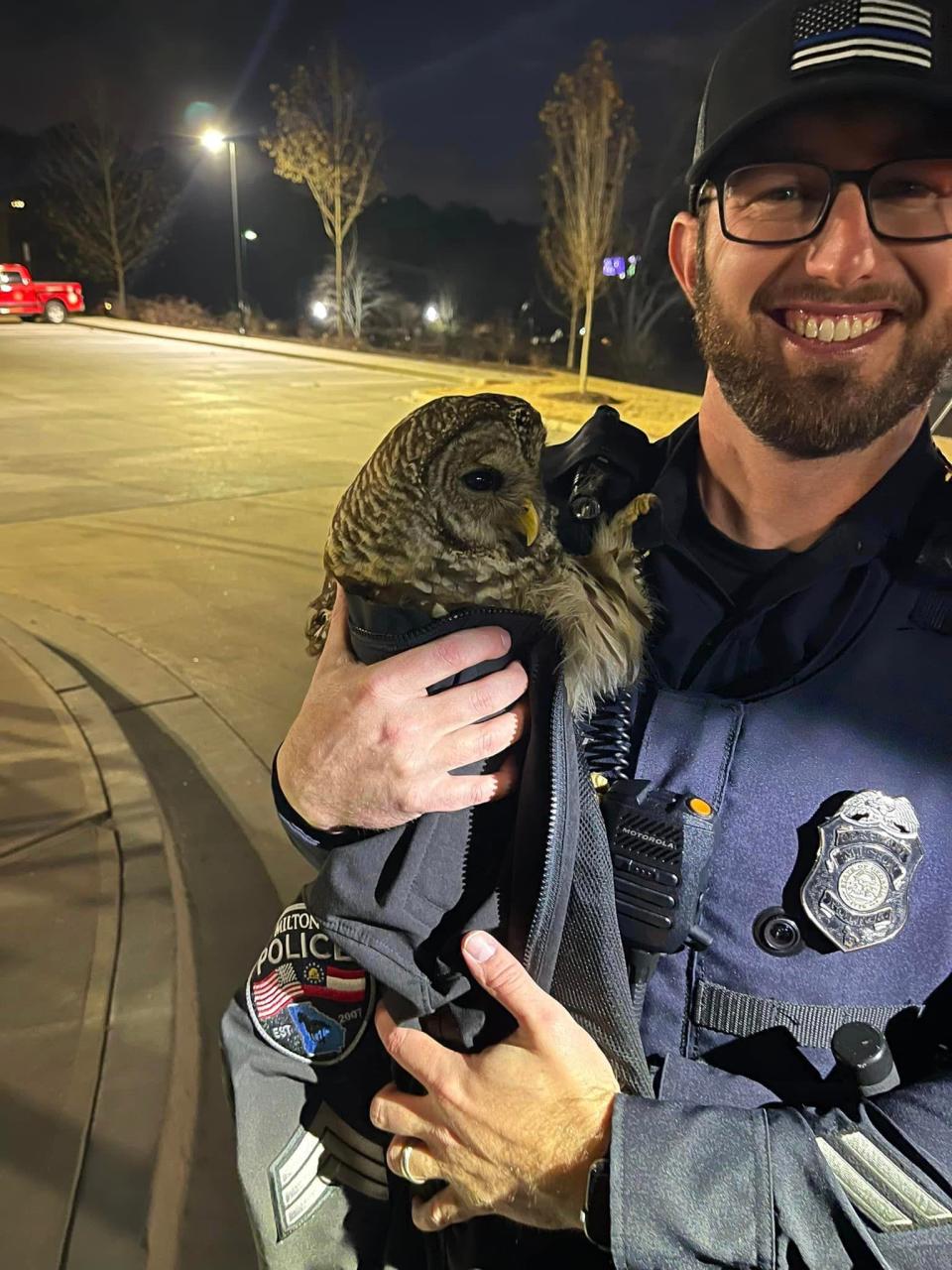 A police officer in Milton, George helped save an owl who had been hit by a car on December 22.