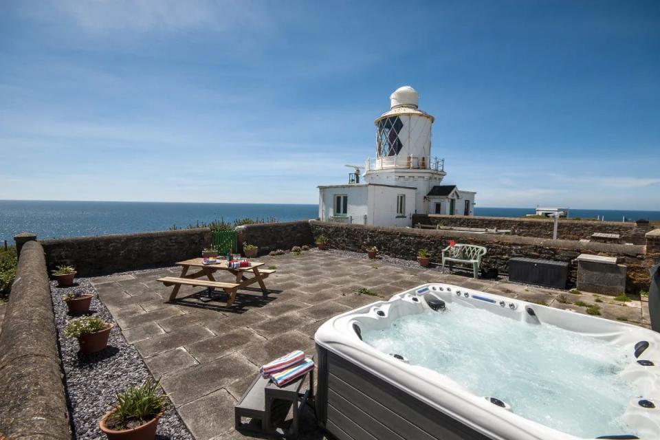 <p><strong>Three nights from £410</strong></p><p><a class="link " href="https://go.redirectingat.com?id=127X1599956&url=https%3A%2F%2Fwww.qualitycottages.co.uk%2Fwales%2Fwest-wales%2Fpembrokeshire%2Fdale-peninsula%2Flighthouse-keep&sref=https%3A%2F%2Fwww.housebeautiful.com%2Fuk%2Flifestyle%2Fg28446801%2Fromantic-hot-tub-uk-breaks%2F" rel="nofollow noopener" target="_blank" data-ylk="slk:BOOK NOW;elm:context_link;itc:0;sec:content-canvas">BOOK NOW</a> <br></p><p>How's this for a hot tub by the sea? Lighthouse Keep is surrounded by the stunning beaches of Pembrokeshire, offering a beautiful location and a traditional cottage from where to experience it. Its large terrace is the perfect spot to relax and have a soak in the sun-kissed hot tub. </p>