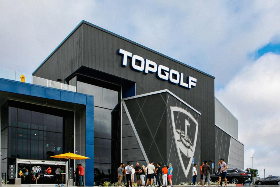 People gather outside the new Topgolf in El Segundo