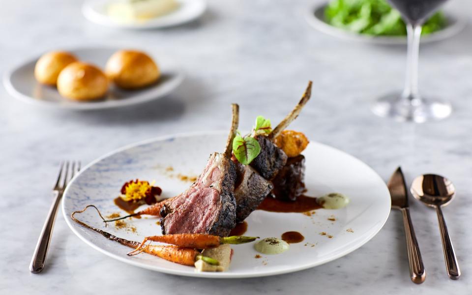 piece of meat artfully decorated on a plate