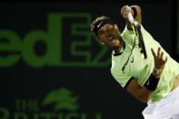 Mar 29, 2017; Miami, FL, USA; Rafael Nadal of Spain serves against Jack Sock of the United States (not pictured) on day nine of the 2017 Miami Open at Crandon Park Tennis Center. Nadal won 6-2, 6-3. Mandatory Credit: Geoff Burke-USA TODAY Sports