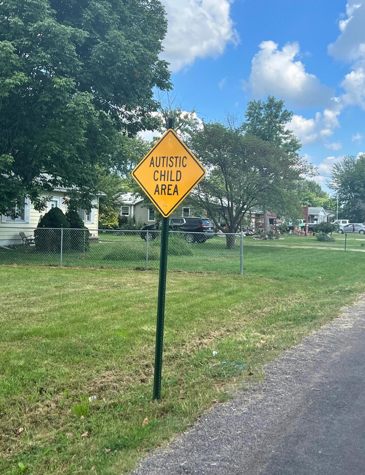 A neighborhood sign alerting drivers about a local child with autism has slowed traffic on one family's street. (Courtesy South Roxana Police Chief Bob Coles)