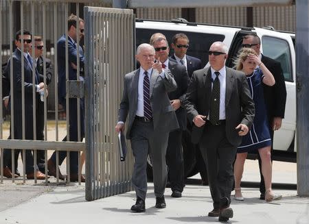 U.S. Attorney General Jeff Sessions during a visit to the U.S. Mexico border wall for a press conference with Immigration and Customs Enforcement Deputy Director Thomas D. Homan, discussing immigration enforcement actions of the Trump Administration near San Diego, California, U.S. May 7, 2018. REUTERS/Mike Blake