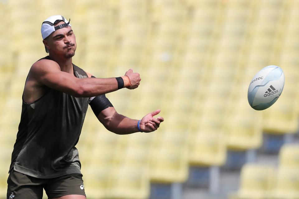 Australia's Jordan Petaia passes the ball during a training session in Auckland on October 16, 2020.