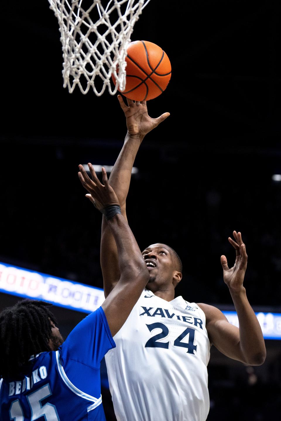 Xavier Musketeers forward Abou Ousmane (24) attempts a layup over Seton Hall Pirates center Jaden Bediako (15) in the first half of the basketball game between Xavier Musketeers and Seton Hall Pirates at the Cintas Center in Cincinnati on Saturday, Dec. 23, 2023.