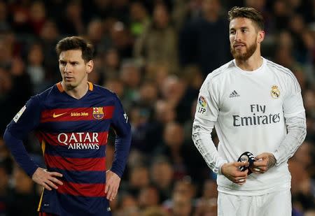 Football Soccer - FC Barcelona v Real Madrid - La Liga - Camp Nou, Barcelona - 2/4/16 Real Madrid's Sergio Ramos looks dejected after being sent off as Barcelona's Lionel Messi looks on Reuters / Albert Gea Livepic