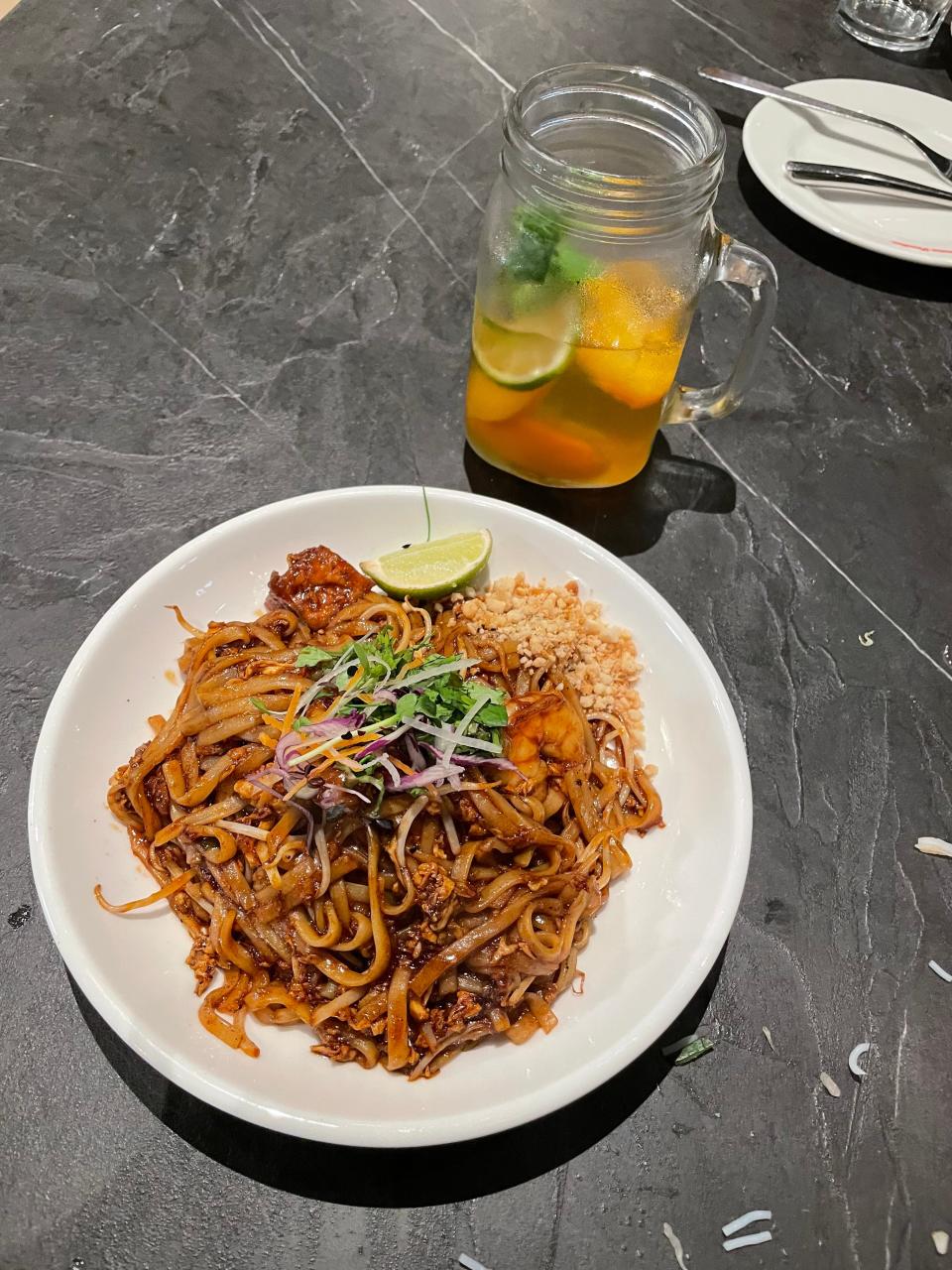 Pad thai with prawns and tofu and peach mint tea on the side