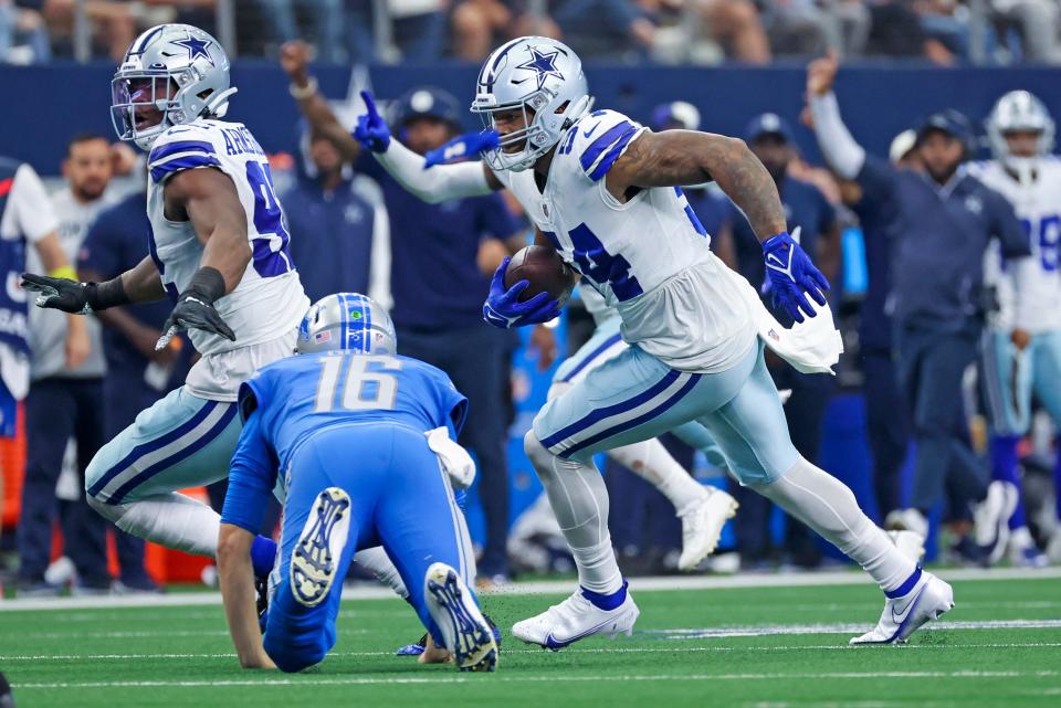 Dallas Cowboys defensive end Sam Williams (54) strips the ball from Detroit Lions quarterback Jared Goff (16) and recovers the fumble during the second half at AT&T Stadium, Oct. 23, 2022 in Arlington, Texas.