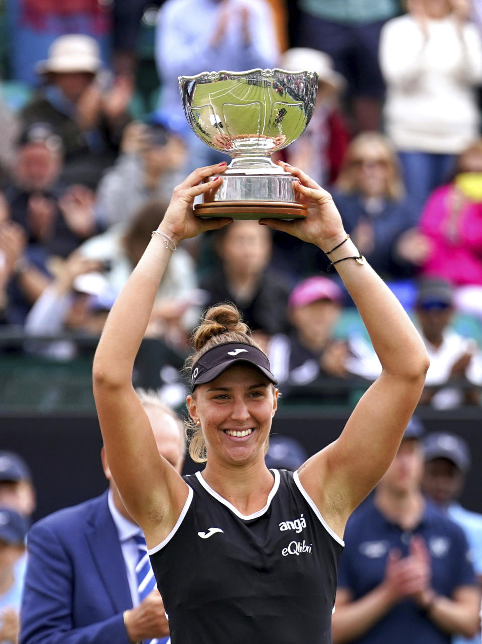 Brazil's Beatriz Haddad Maia celebrates with the trophy after defeating USA's Alison Riske in the women's singles final of the Nottingham Cup Open tennis championship in Nottingham, England, Sunday June 12, 2022. (Tim Goode/PA via AP)