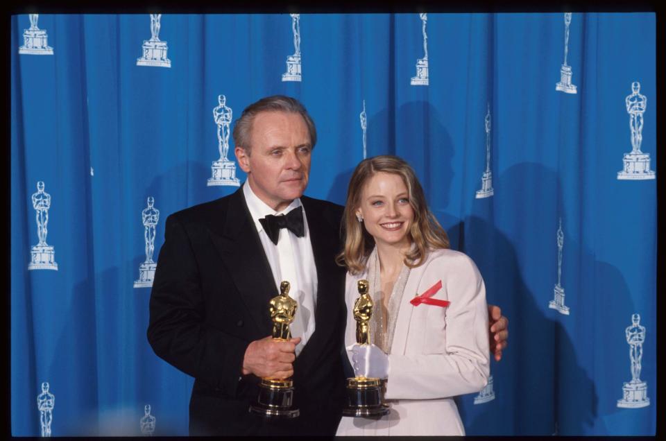 120528 13: Best Actor recipient Anthony Hopkins stands with Best Actress recipient Jodie Foster at the 64th annual Academy Awards March 30, 1992 in Los Angeles, CA. The Academy of Motion Picture Arts and Sciences awarded five Oscars to the film 