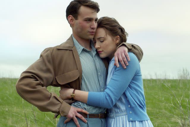 <p>Kerry Brown/Fox Searchlight/Kobal/Shutterstock</p> Emory Cohen and Saoirse Ronan in "Brooklyn"