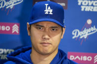 Los Angeles Dodgers' Shohei Ohtani speaks with reporters before a baseball game against the Washington Nationals at Nationals Park, Wednesday, April 24, 2024, in Washington.(AP Photo/Alex Brandon)