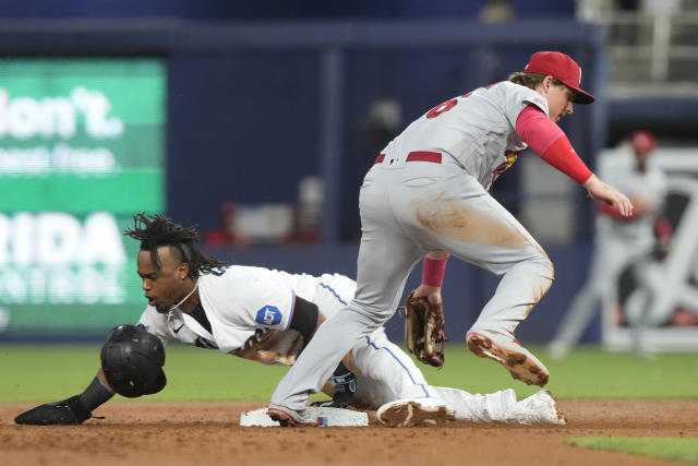 Arenado walks off Marlins as Cardinals appear intent upon adding