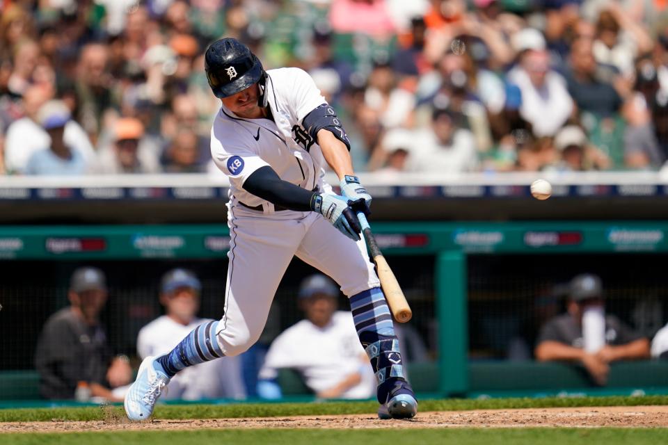 Detroit Tigers' Spencer Torkelson hits a two-run single against the Texas Rangers in the fifth inning of a baseball game in Detroit, Sunday, June 19, 2022.