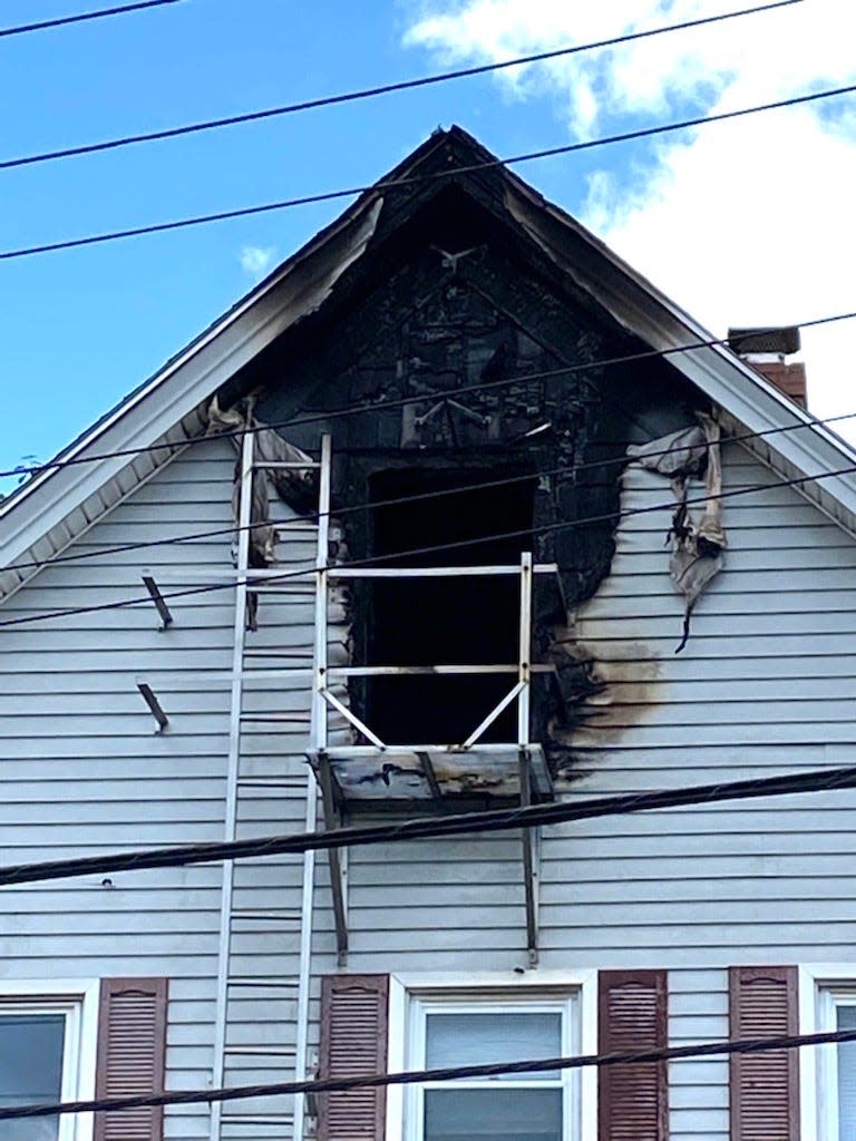 A man was killed at this house at 415 Danforth St. after an "electrical event" that also ignited a fire, officials said.