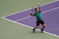 Apr 2, 2017; Key Biscayne, FL, USA; Roger Federer of Switzerland serves against Rafael Nadal of Spain (not pictured) in the men's singles championship of the 2017 Miami Open at Crandon Park Tennis Center. Mandatory Credit: Geoff Burke-USA TODAY Sports