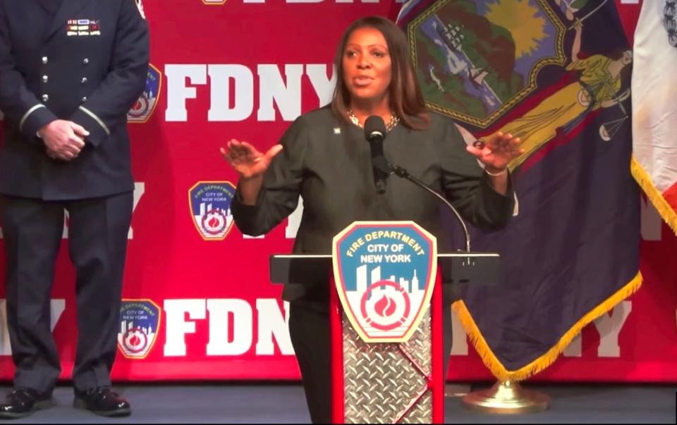 New York State Attorney General Letitia James tries to quiet the boos at an FDNY promotion ceremony in Brooklyn. NY Post