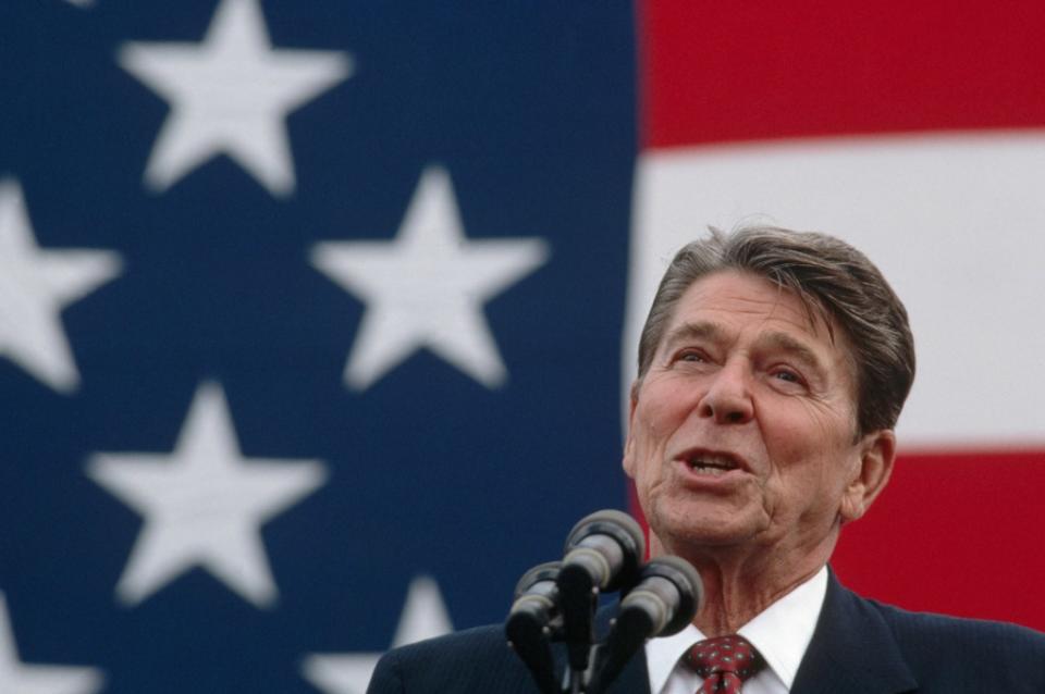 President Ronald Reagan makes a stump speech in front of a large American flag. (Photo by © Wally McNamee/CORBIS/Corbis via Getty Images)