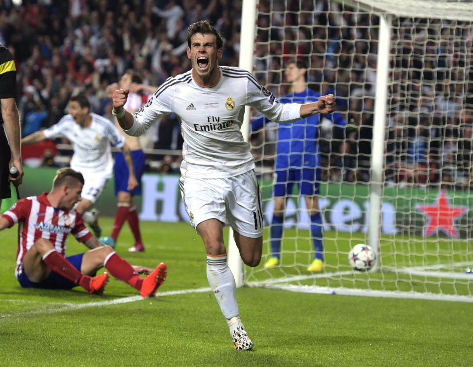 FILE - Real Madrid's Gareth Bale celebrates after scoring his side's second goal in the Champions League final soccer match against Atletico Madrid at the Luz Stadium in Lisbon, Portugal, Saturday, May 24, 2014. (AP Photo/Manu Fernandez, File)