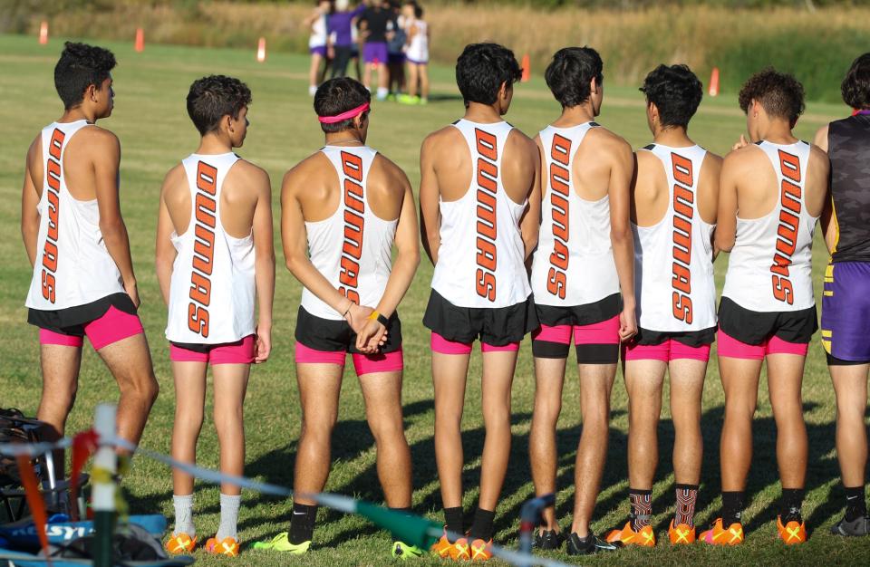 The Dumas boys get ready to compete in the Region I-4A cross country meet on Monday, Oct. 24, 2022 at Mae Simmons Park.