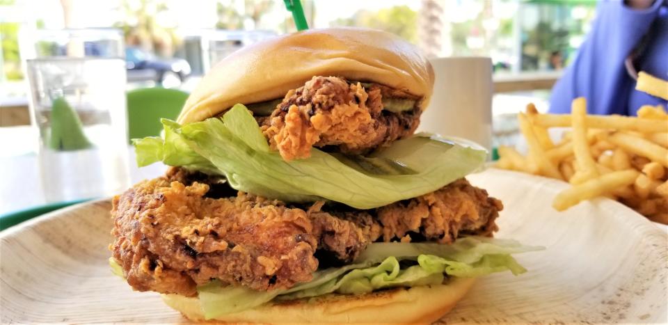 The Overton in The Rosemary District serves a double stack fried chicken sandwich.